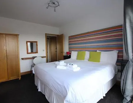 Waves Guest Suites Castel Exterior photo